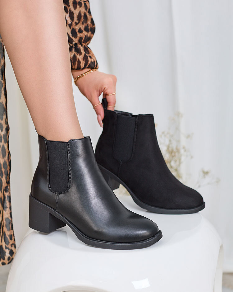Resti Black women&#039;s boots on a post Nanhelyna