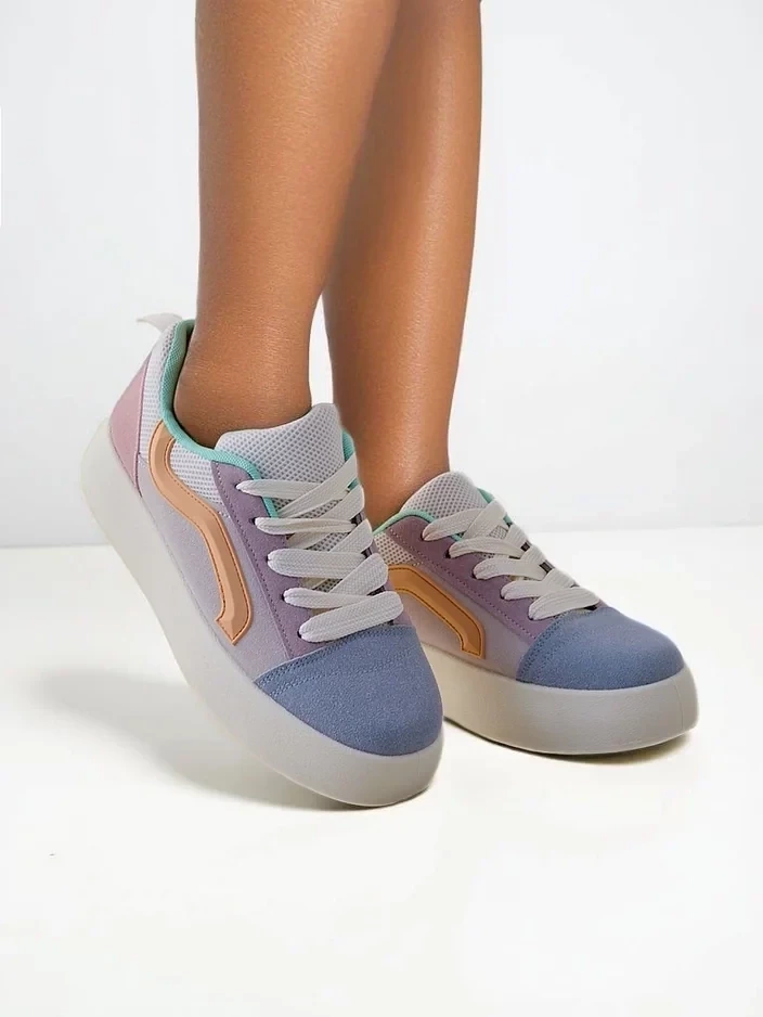 Resti Women's sports sneakers on a platform Ensis