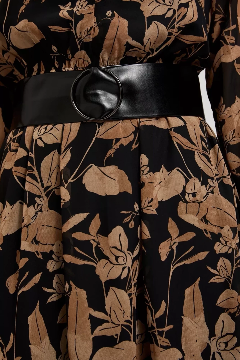 Marisse Black Dress With A Flared Bottom And A Floral Print