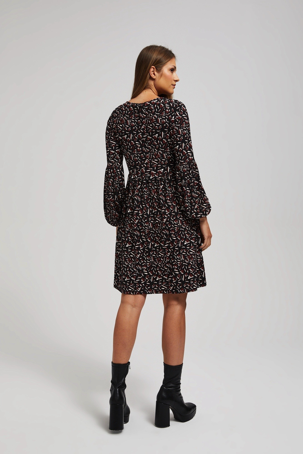 Marisse Black Dress With Puffed Sleeves And A Flared Bottom