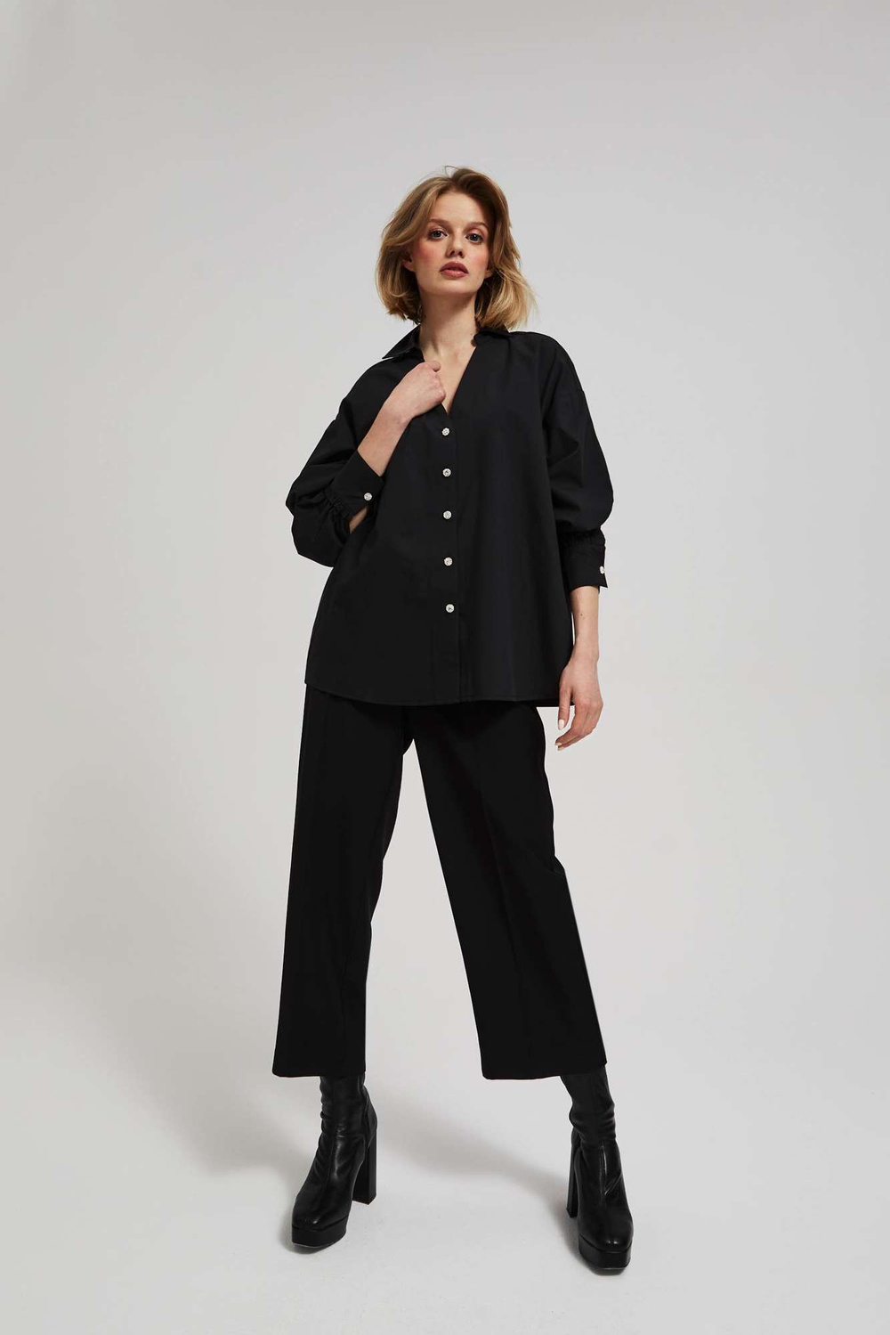 Shirt with decorative buttons