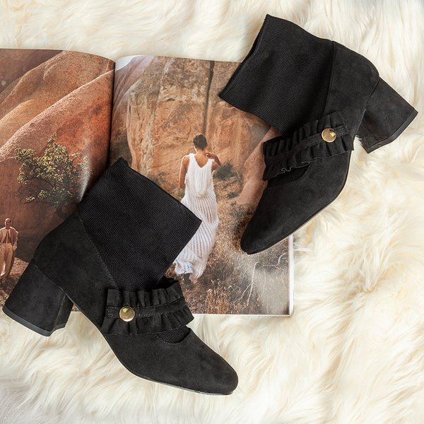 Resti Black pumps on a higher post with a Preciosa sock - Footwear