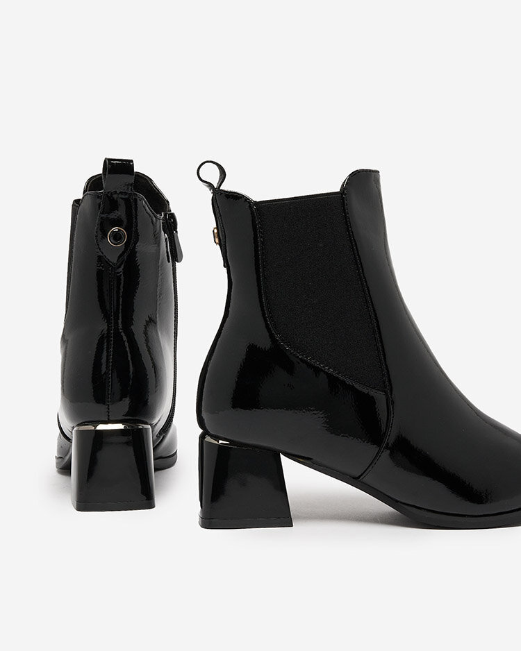 Resti Black women&#039;s boots on a low post Nekery