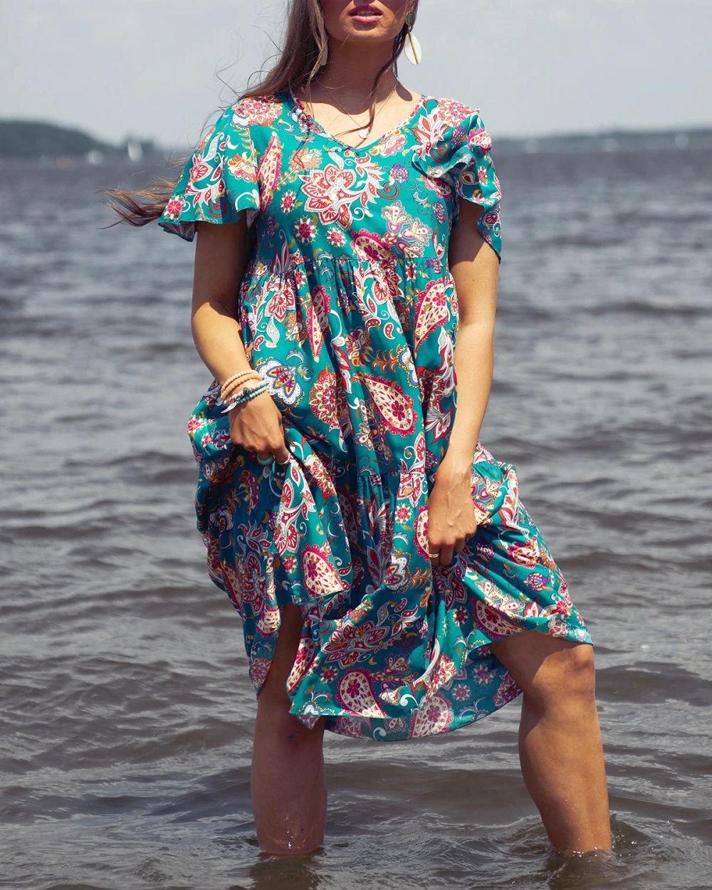 Resti Green women's dress with colorful floral pattern