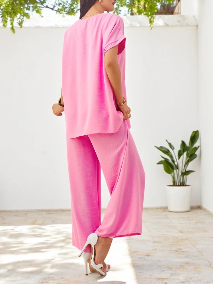 Resti Women's short-sleeved set with decorative flower and wide trousers