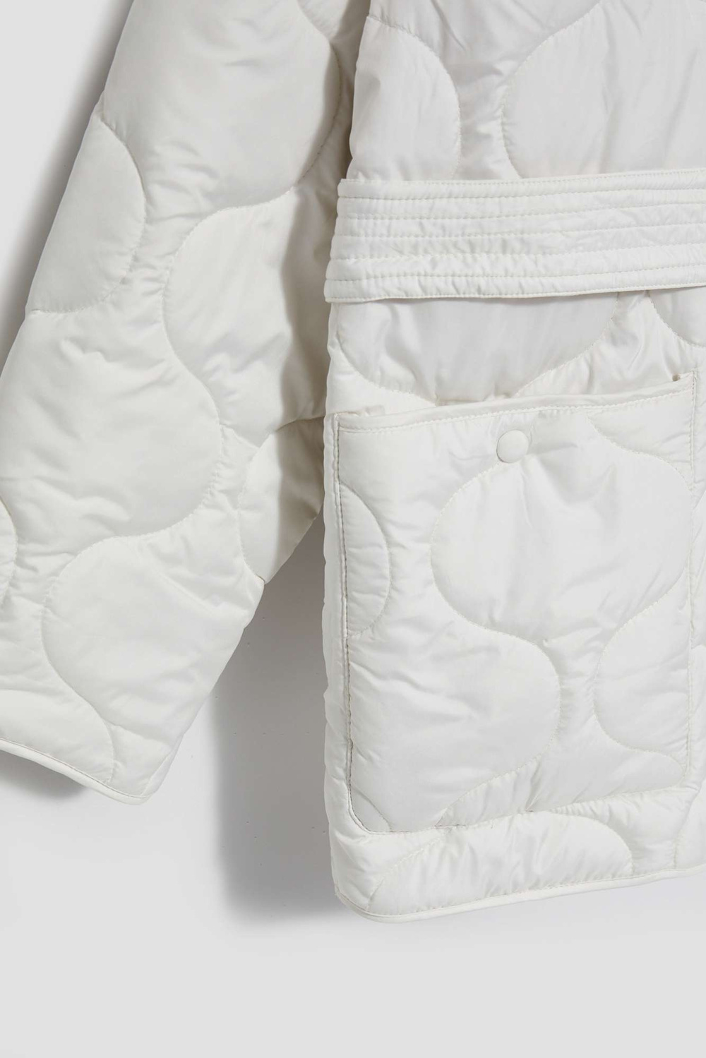 Jachetă matlasată cu curea în talie