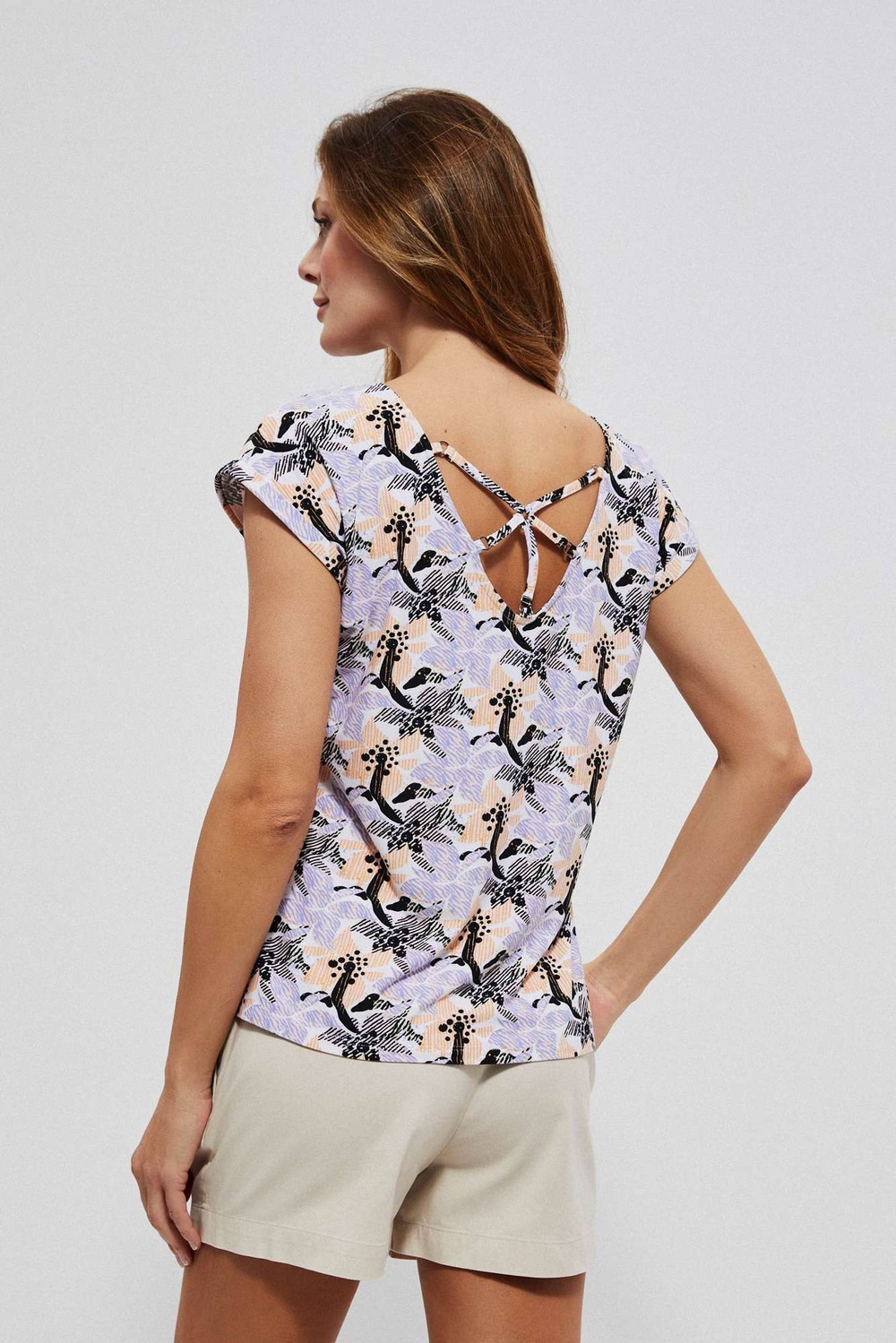 Blouse with decorative back