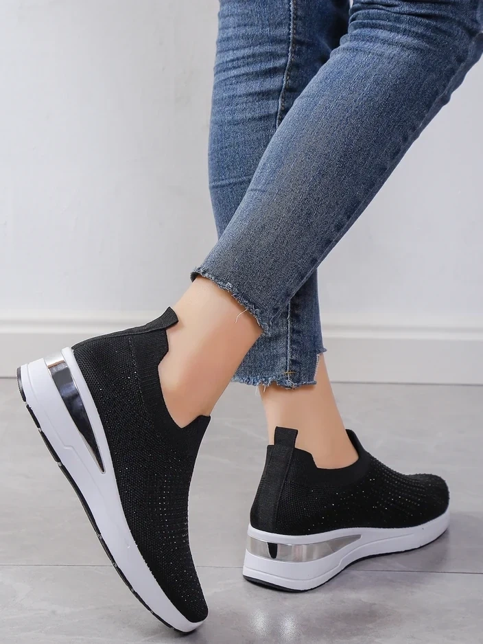 Resti Women's slip-on sneakers on a wedge with rhinestones Qelavise