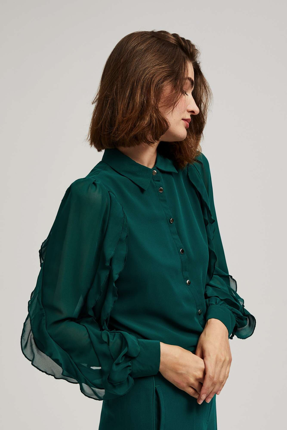 Shirt with ruffles on the sleeves