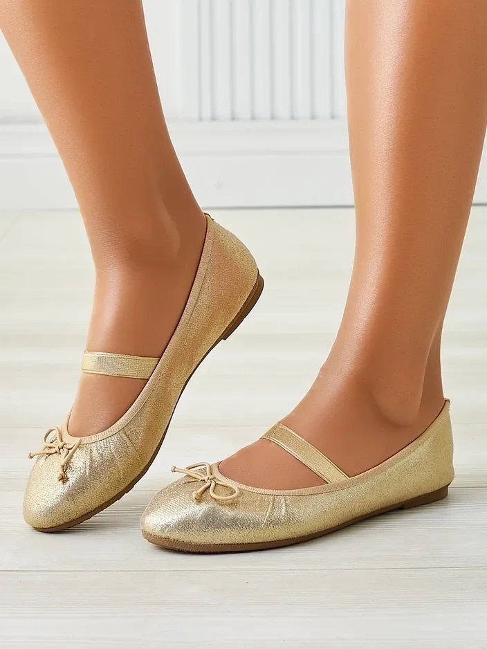 Resti Shiny women&#039;s ballet flats with a bow and elastic Safte