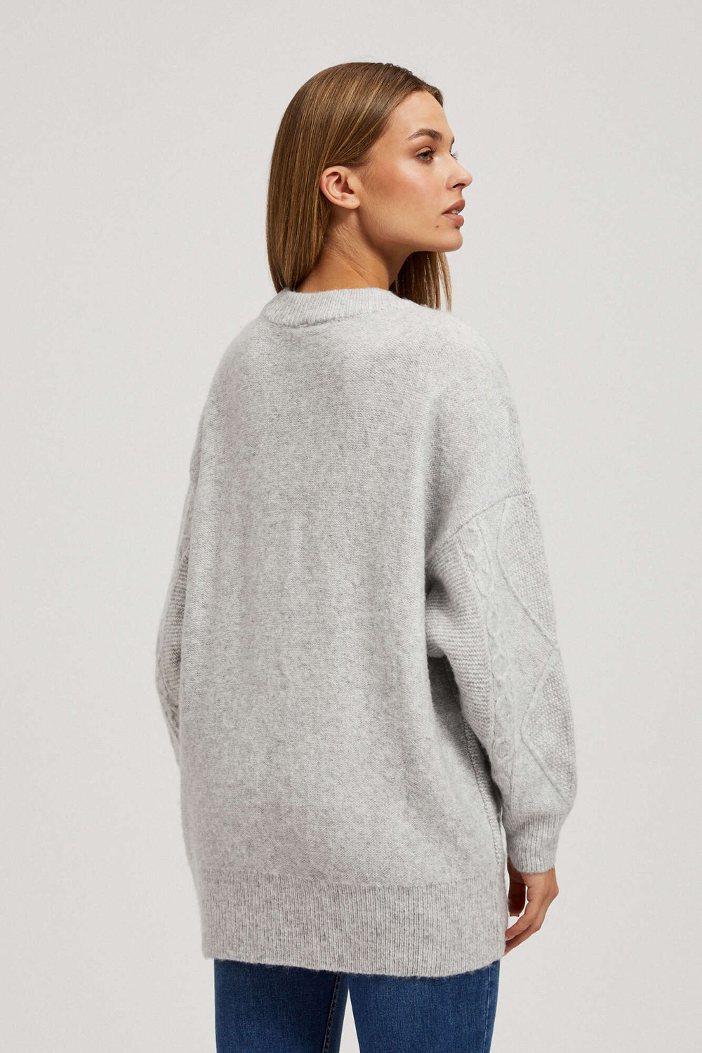 Sweater with decorative fabric