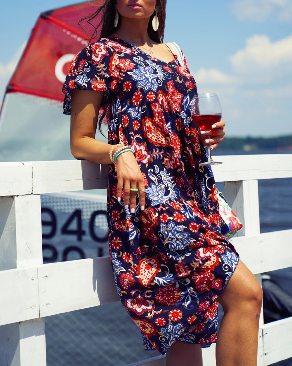 Resti Navy blue women's dress with colorful floral pattern