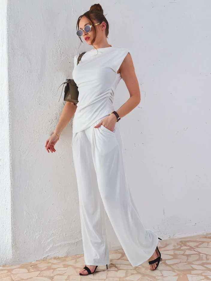 Resti Women's ribbed set, with an asymmetrical sleeveless top and flared pants