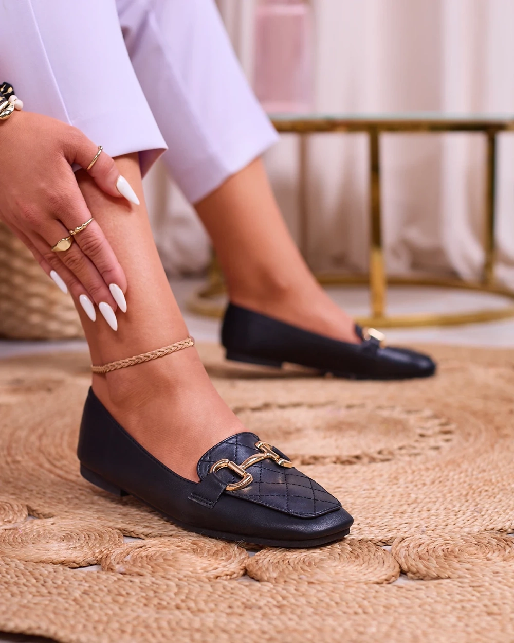 Resti Black women&#039;s quilted moccasins with gold embellishment Wetifa