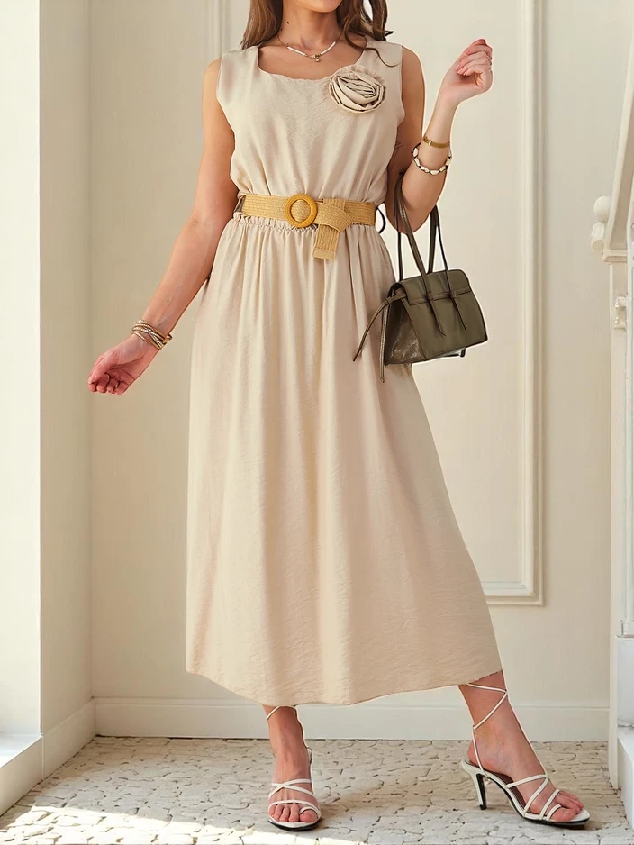 Resti Womens midi dress with straps, featuring a round neckline with decorative flower