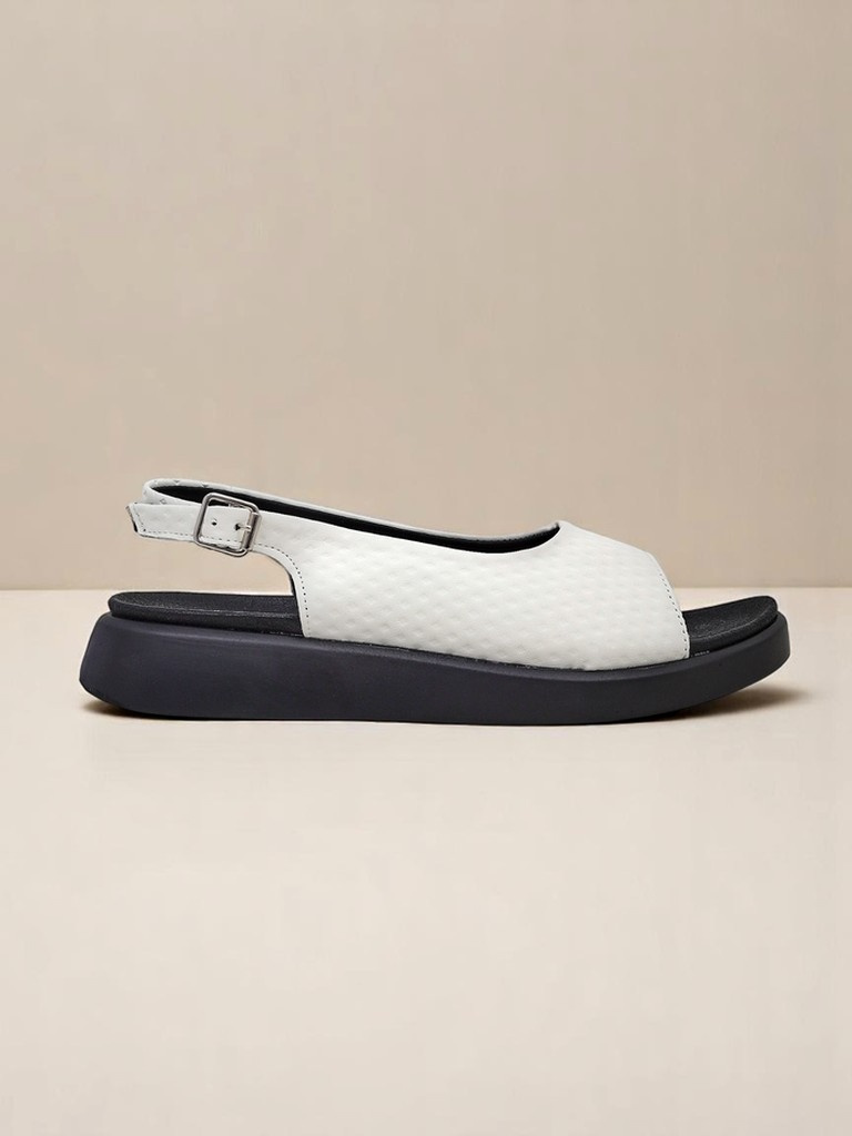 Resti Women&#039;s Riva sandals on a thick sole