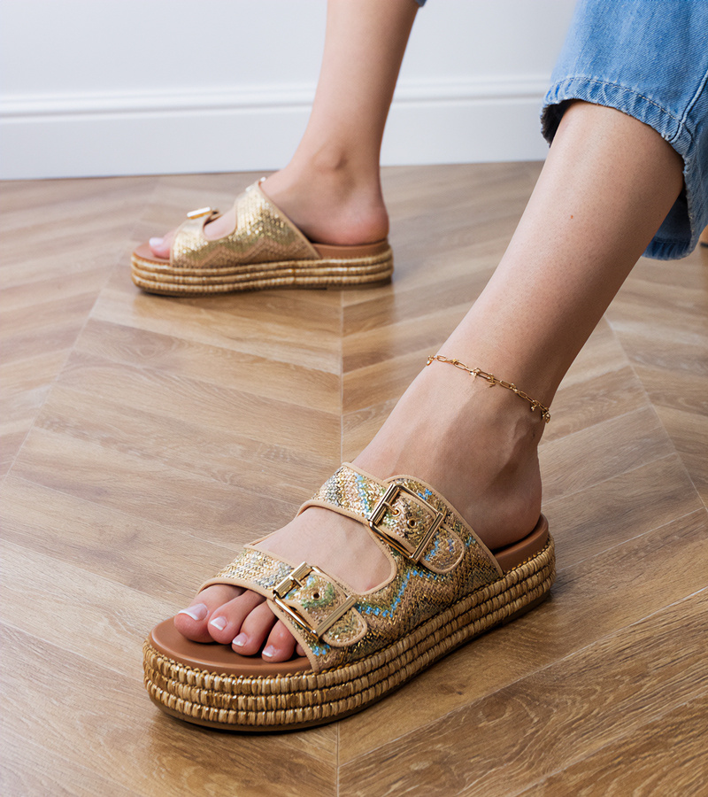 D/CEO Golden sandals with buckles on the straps Rider