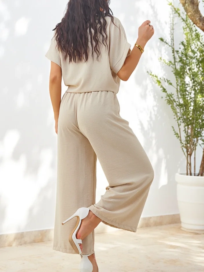 Resti Women's set with a tied short-sleeve shirt and flared pants with rhinestones