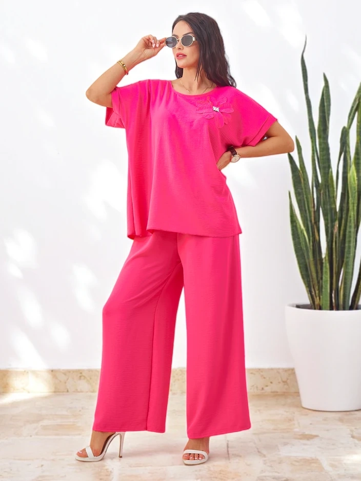 Resti Women's set with short sleeves, decorative flower, and wide trousers