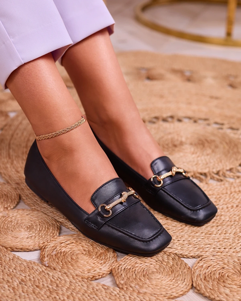 Resti Black women&#039;s moccasins with gold embellishment Olerika