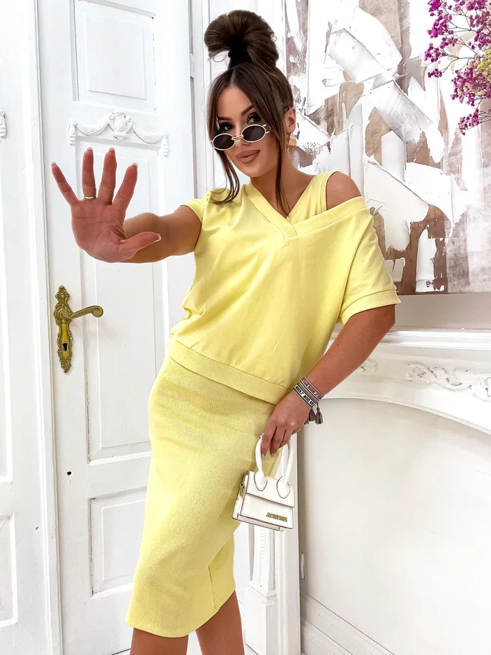 Resti Womens set with a revealing sweatshirt and knee-length dress