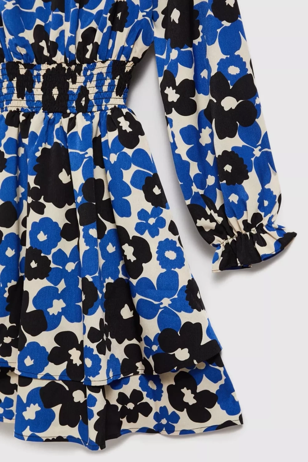 Marisse Blue Dress With A Flared Bottom And A Floral Pattern