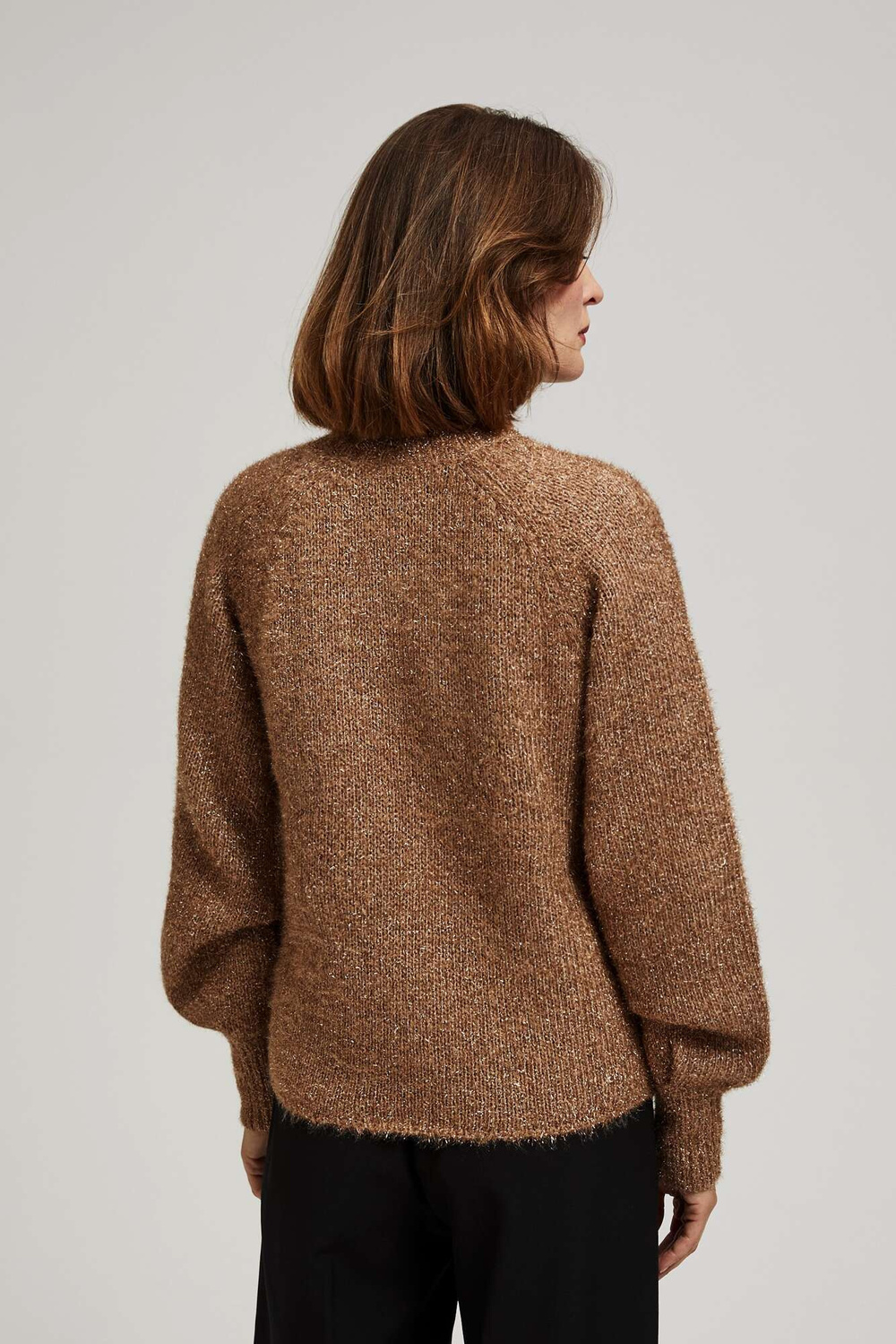 Turtleneck sweater decorated with metallic thread