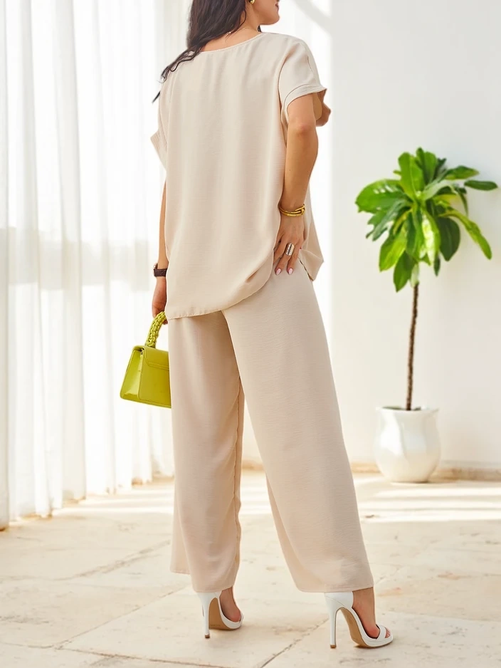 Resti Women's set with short sleeves, decorative flower, and wide pants