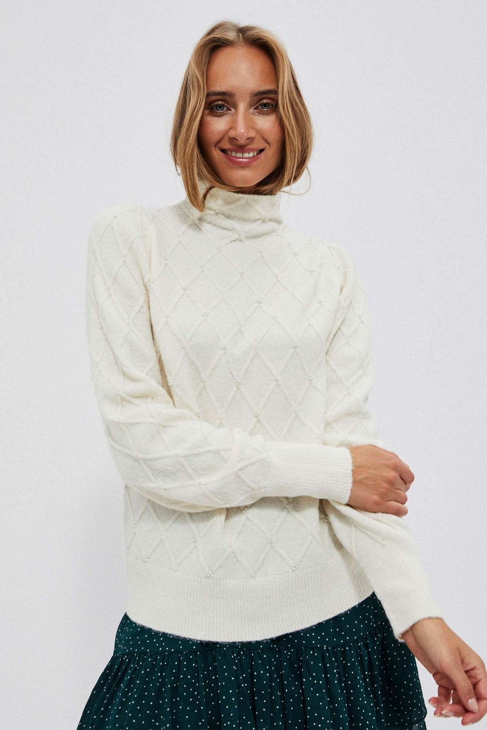 Turtleneck with geometric stitching
