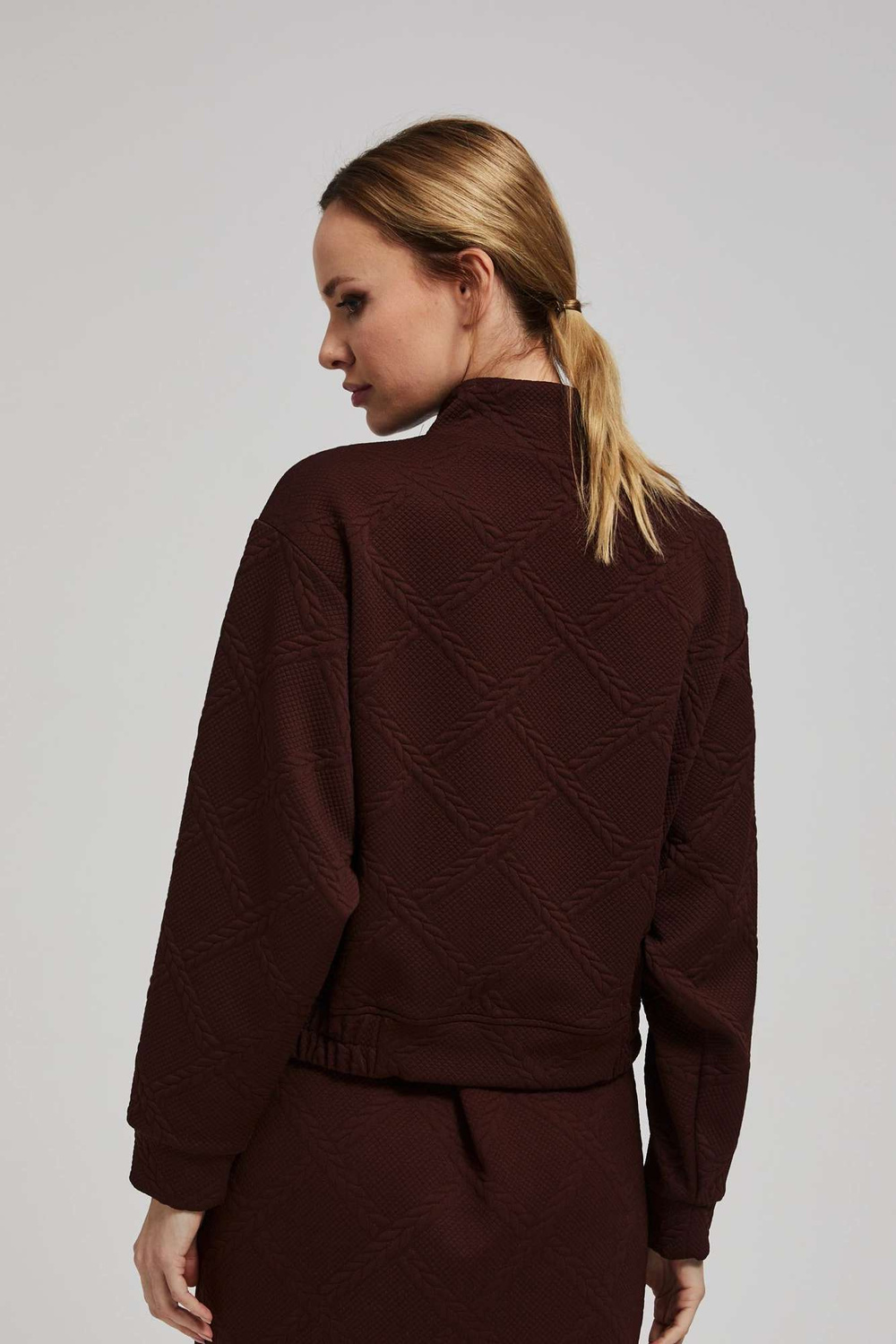 Sweatshirt with decorative buttons