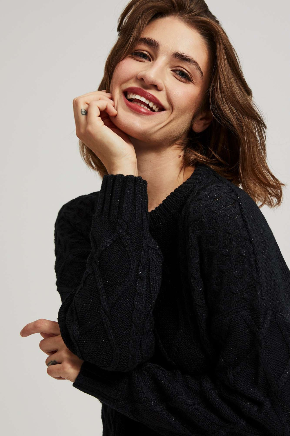 Sweater with decorative fabric