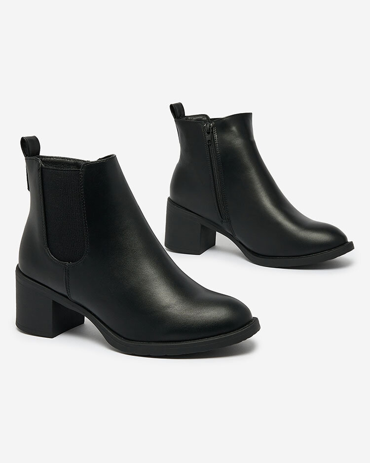 Resti Black women&#039;s boots on a post Nanhelyna