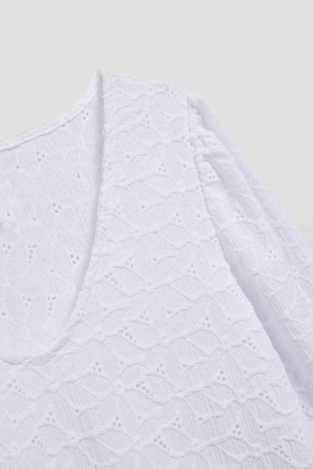 Openwork blouse with a V-neck