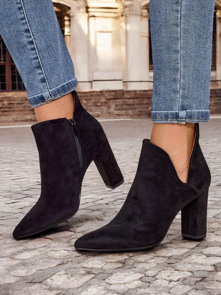 Resti Black boots with cut from Alania - Footwear