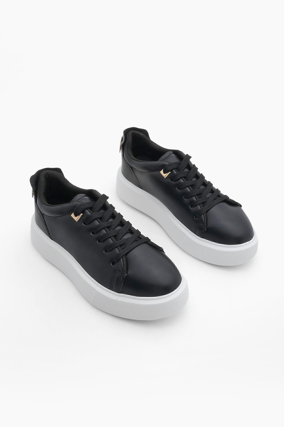 Teniși de damă Marjin