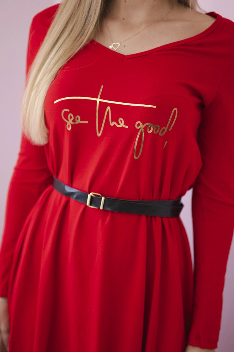 Dress with decorative belt and red inscription