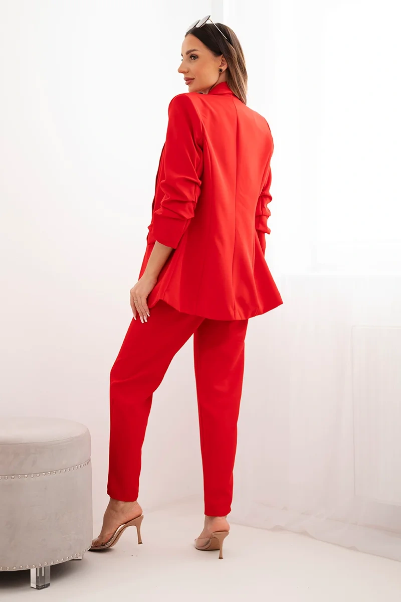 Elegant set of jacket and trousers in red color