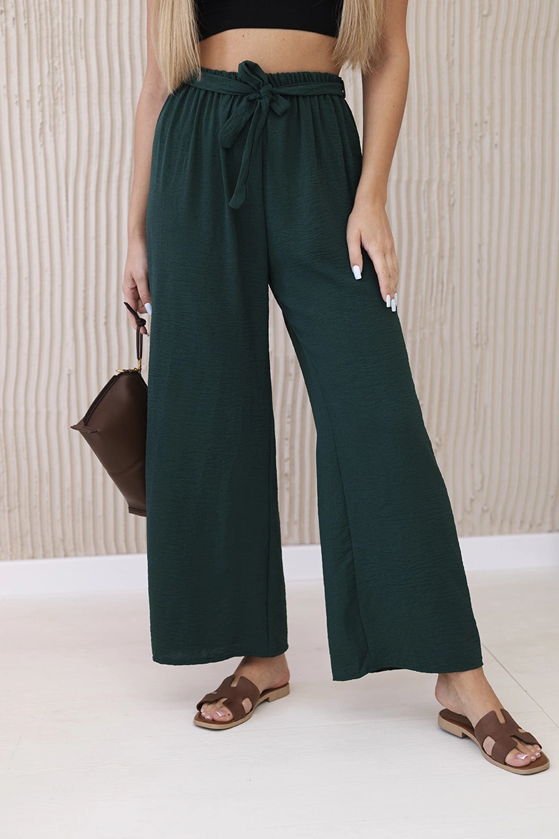 Wide-waisted trousers in dark green colour