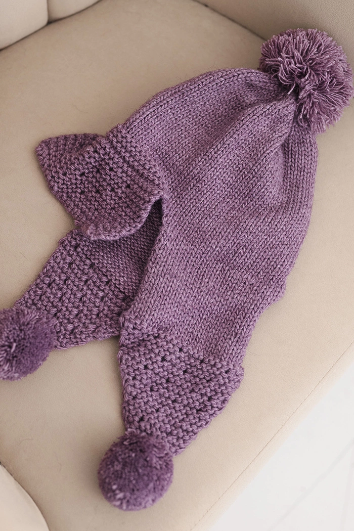 Kesi Women's winter cap with wool, visor, and pom-poms K475 purple