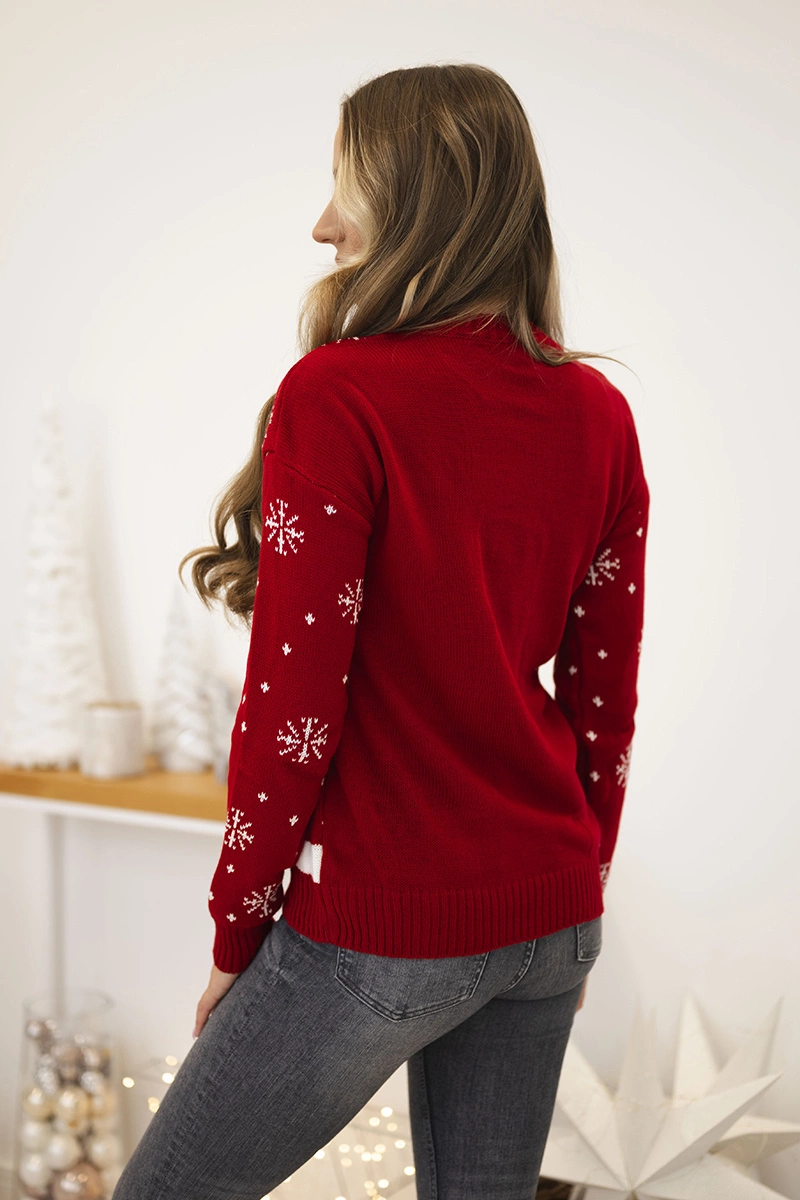 Christmas sweater with red lettering