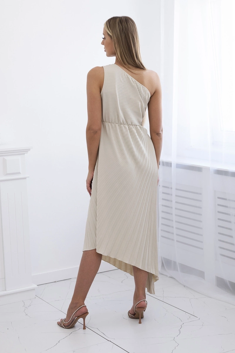 Women&#039;s pleated dress with flower - beige