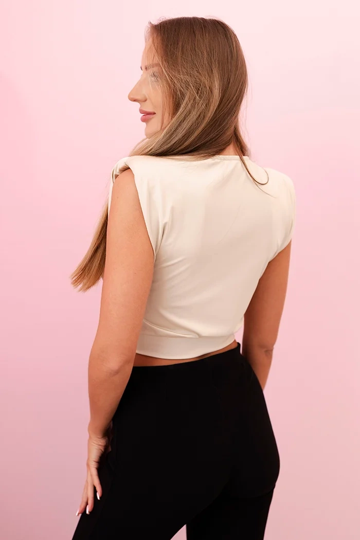 Kesi Włoski Women's blouse with a deep neckline and a decorative detail beige