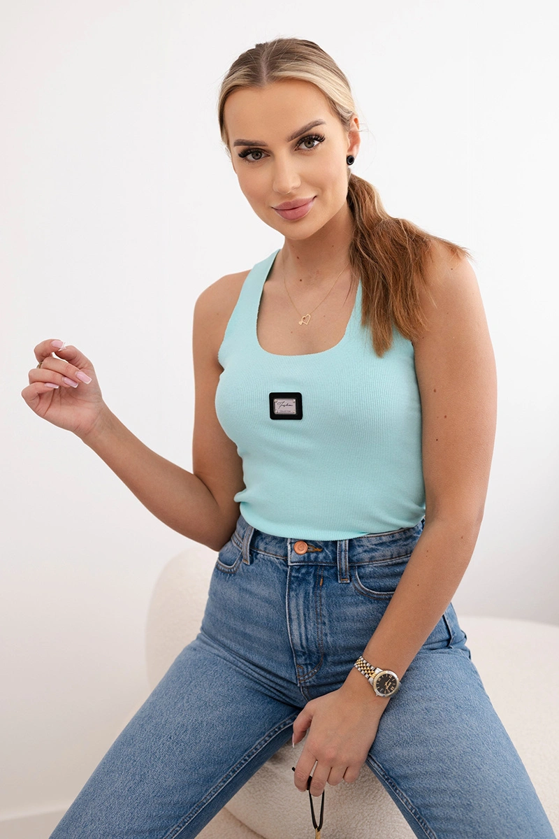 Striped blouse with a metal plate of mint