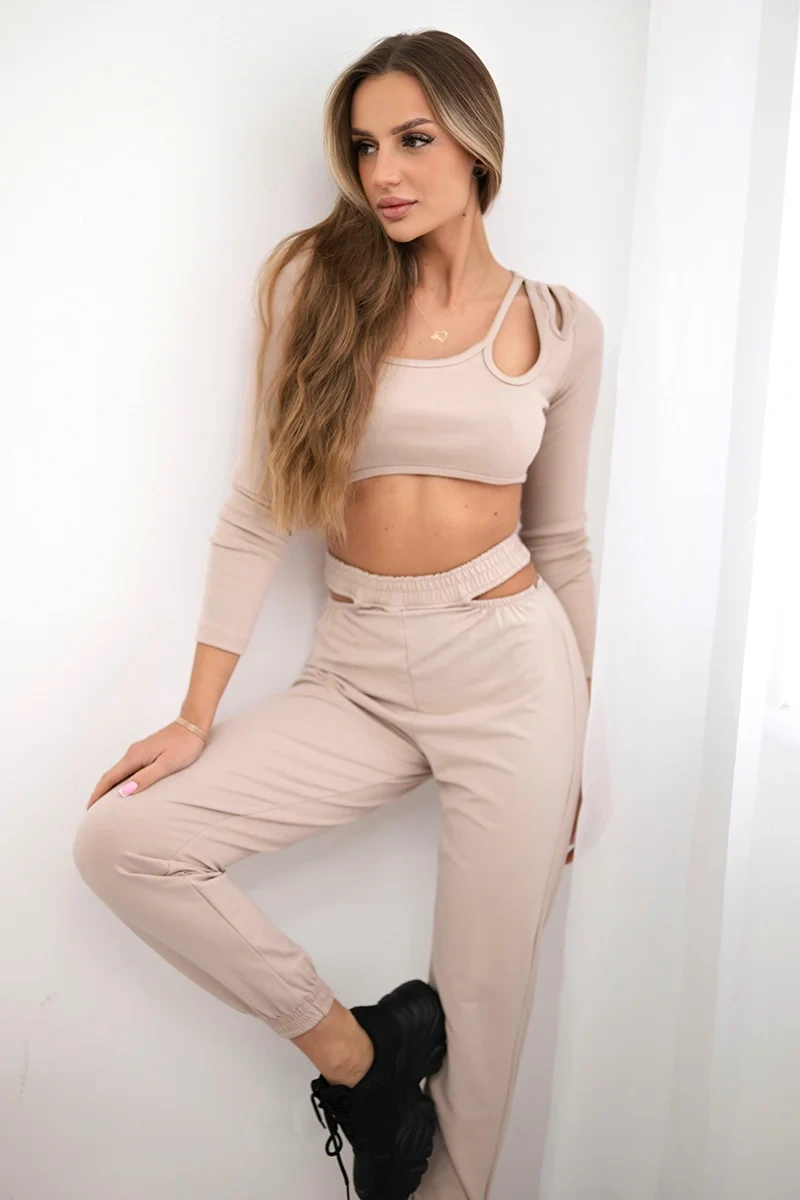Complete with a beige blouse top