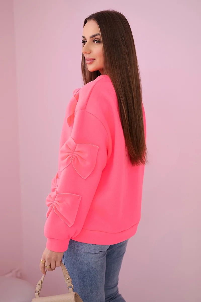 Insulated sweatshirt with pink neon decorative bows