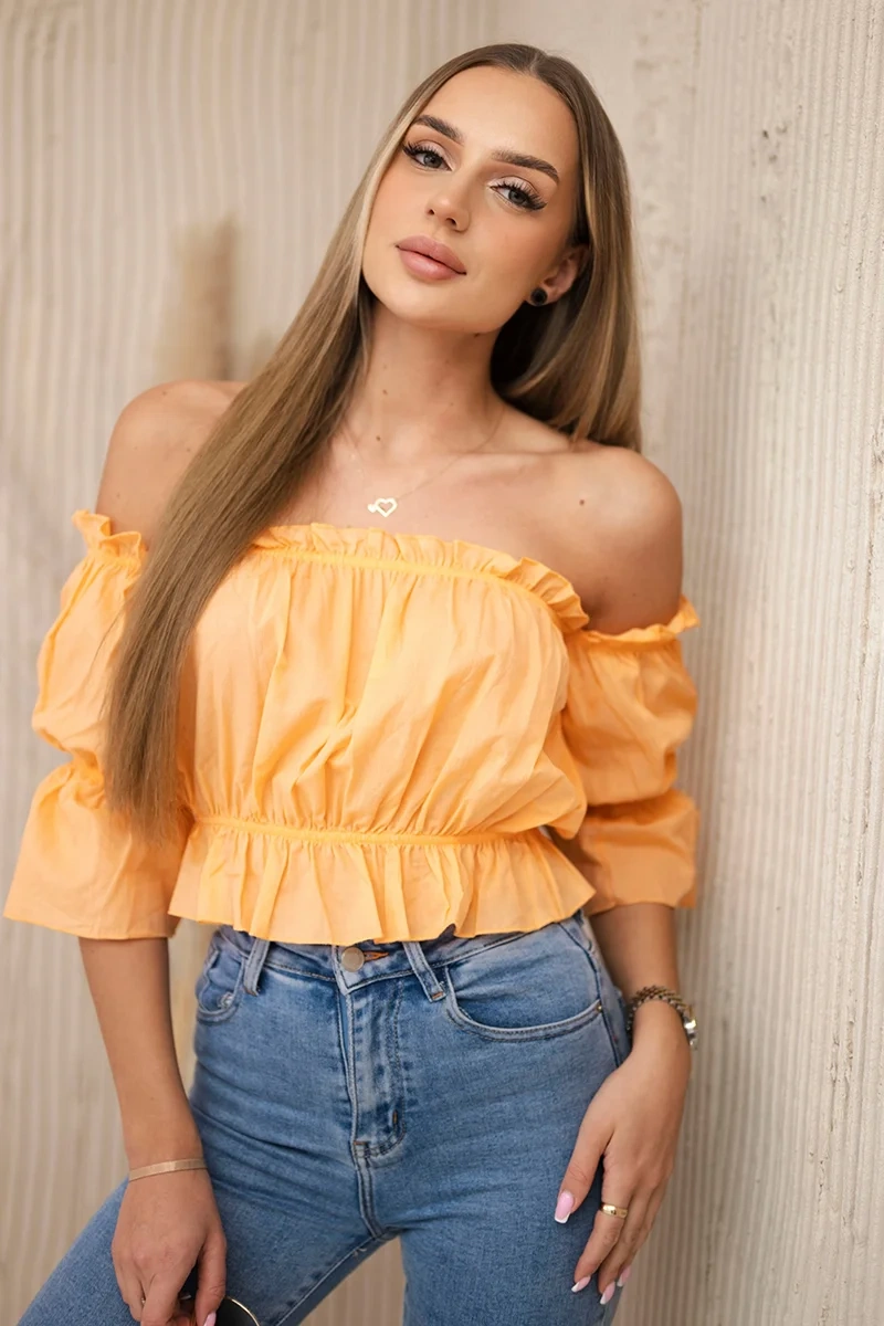 Peach blouse without shoulders