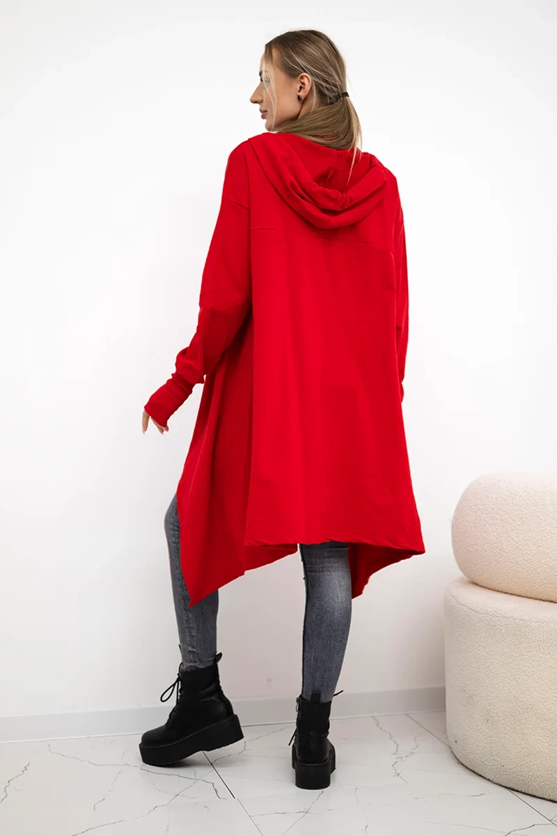 The blouse flars red at the bottom