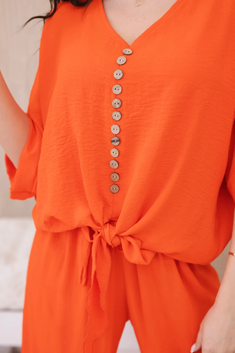 Set of blouses with orange trousers
