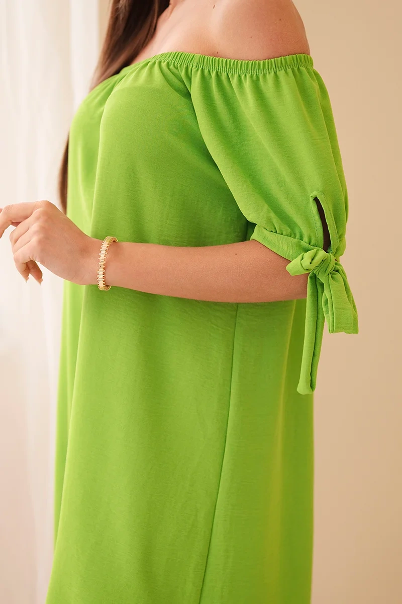 Pistachio dress with ties on the sleeves