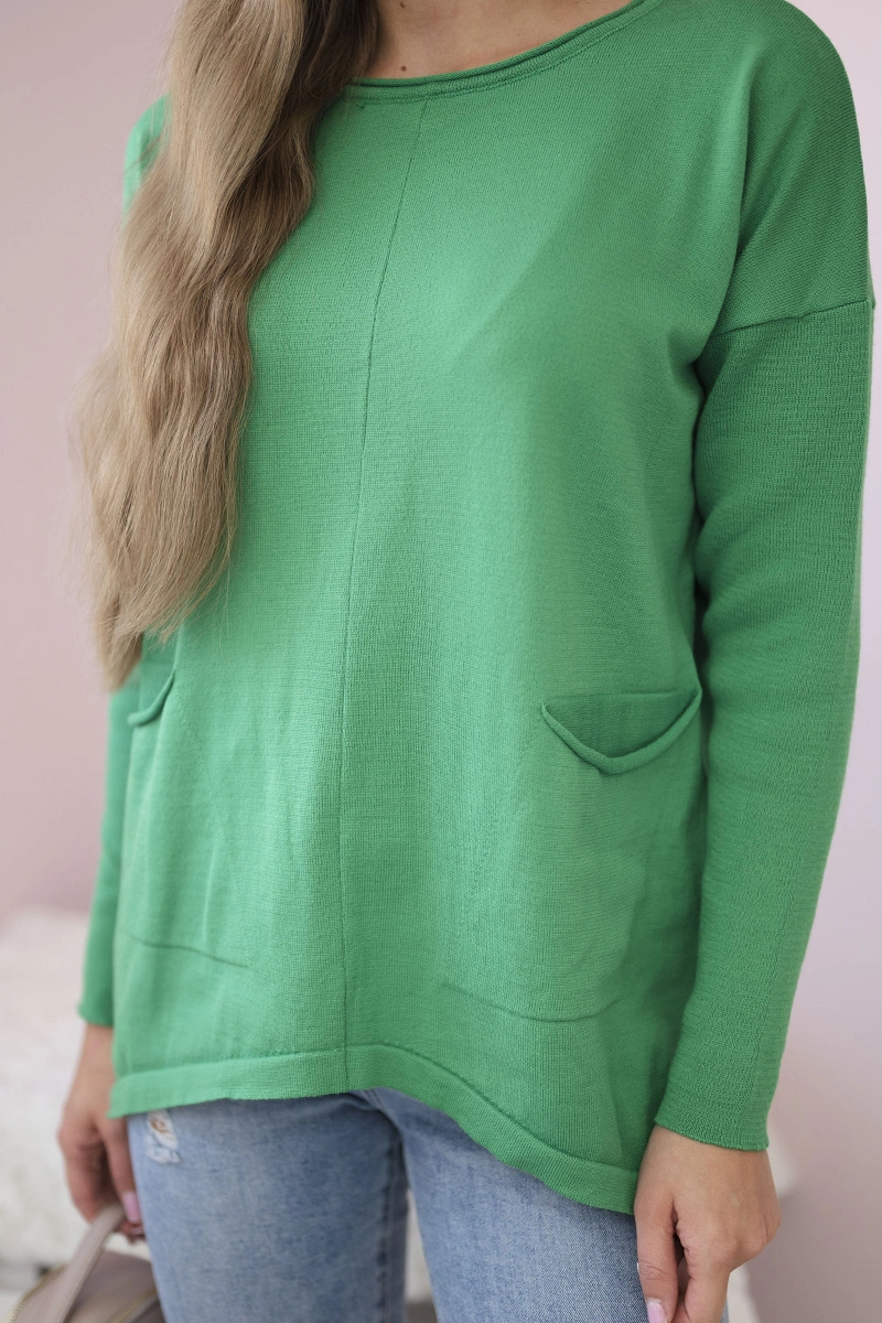 Sweater with front pockets in light green color